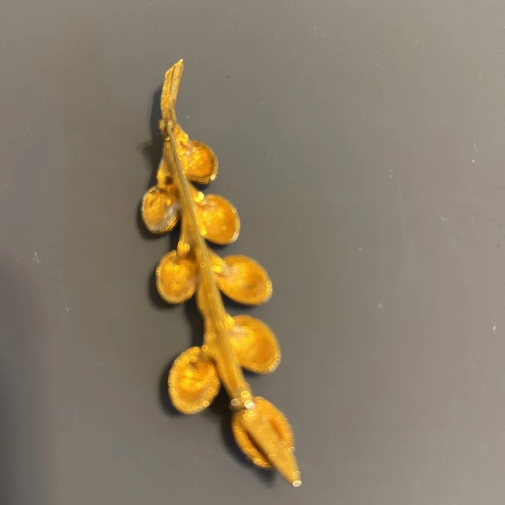 Gorgeous gold tone nugget branch brooch with coral colored beads